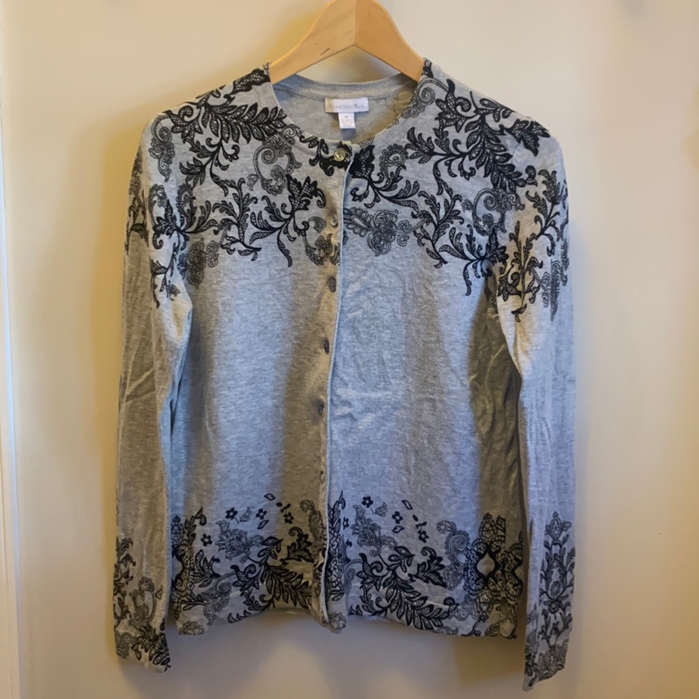 Charter Club grey sweater with black  floral design.